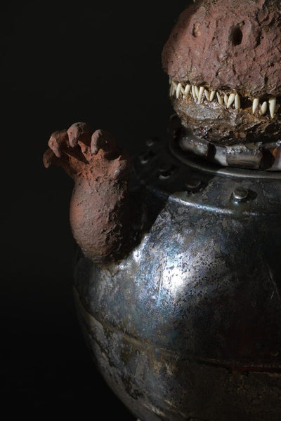 Ceramic Artwork Showcase: Multi-Eyed Monster